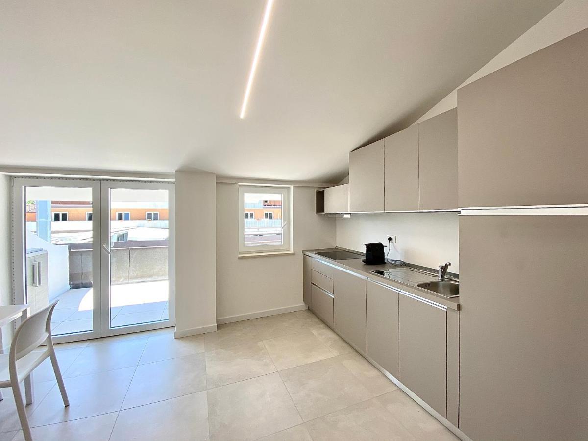 EM Apartments Lignano Sabbiadoro Exterior foto